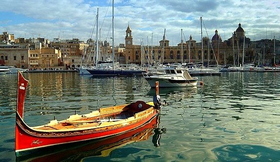 A Maltese dghajsa in the Birgu Marina Waterfront, Cottonera, Malta
