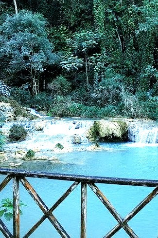 The turquoise waters of Kuang Si Falls near Luang Prabang, Laos