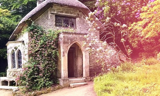 Cottage in the woods at Stourhead Estate Gardens in Wiltshire, England